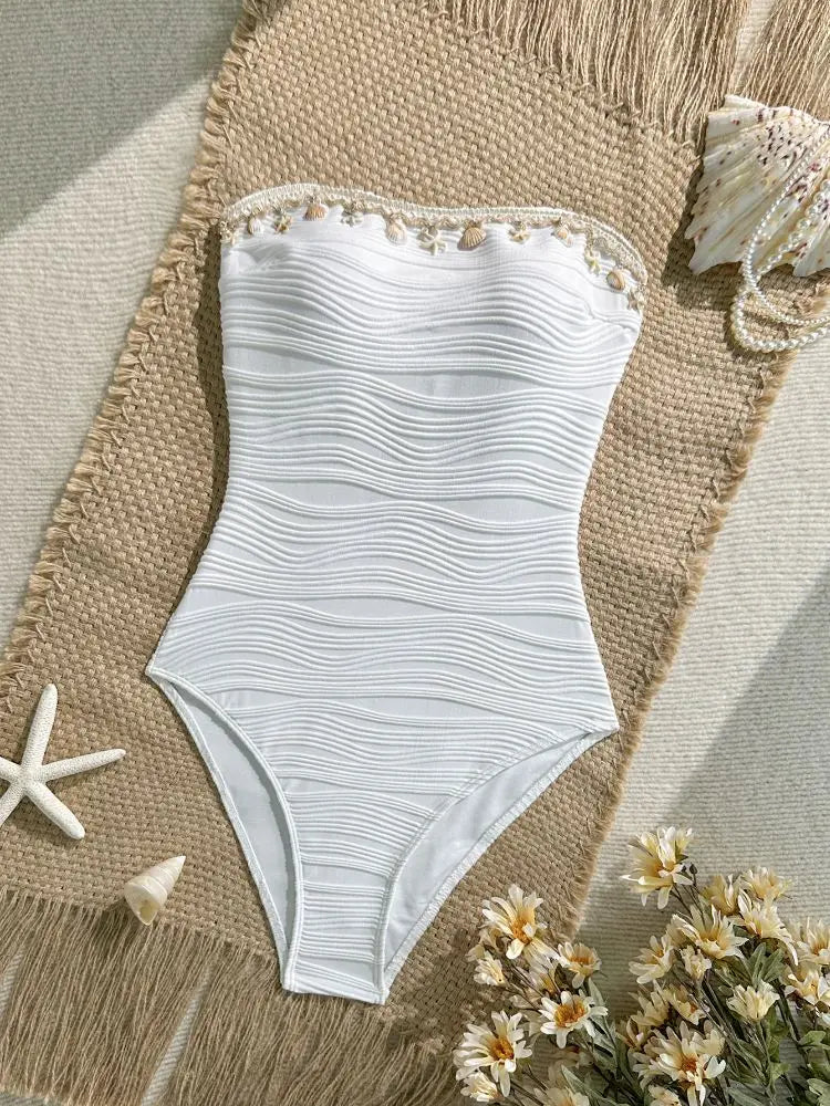 Close-up of the shell-inspired pearl trim