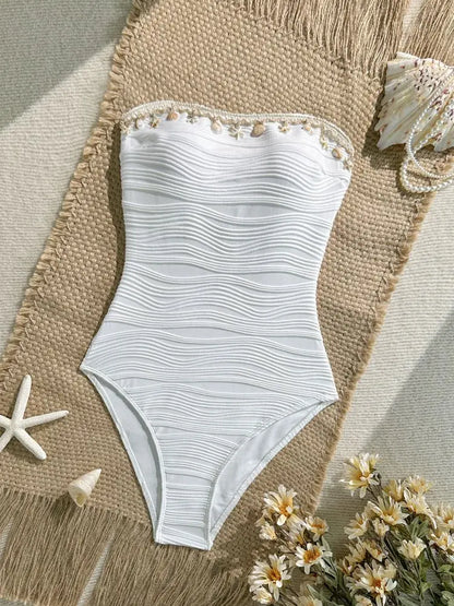 Close-up of the shell-inspired pearl trim