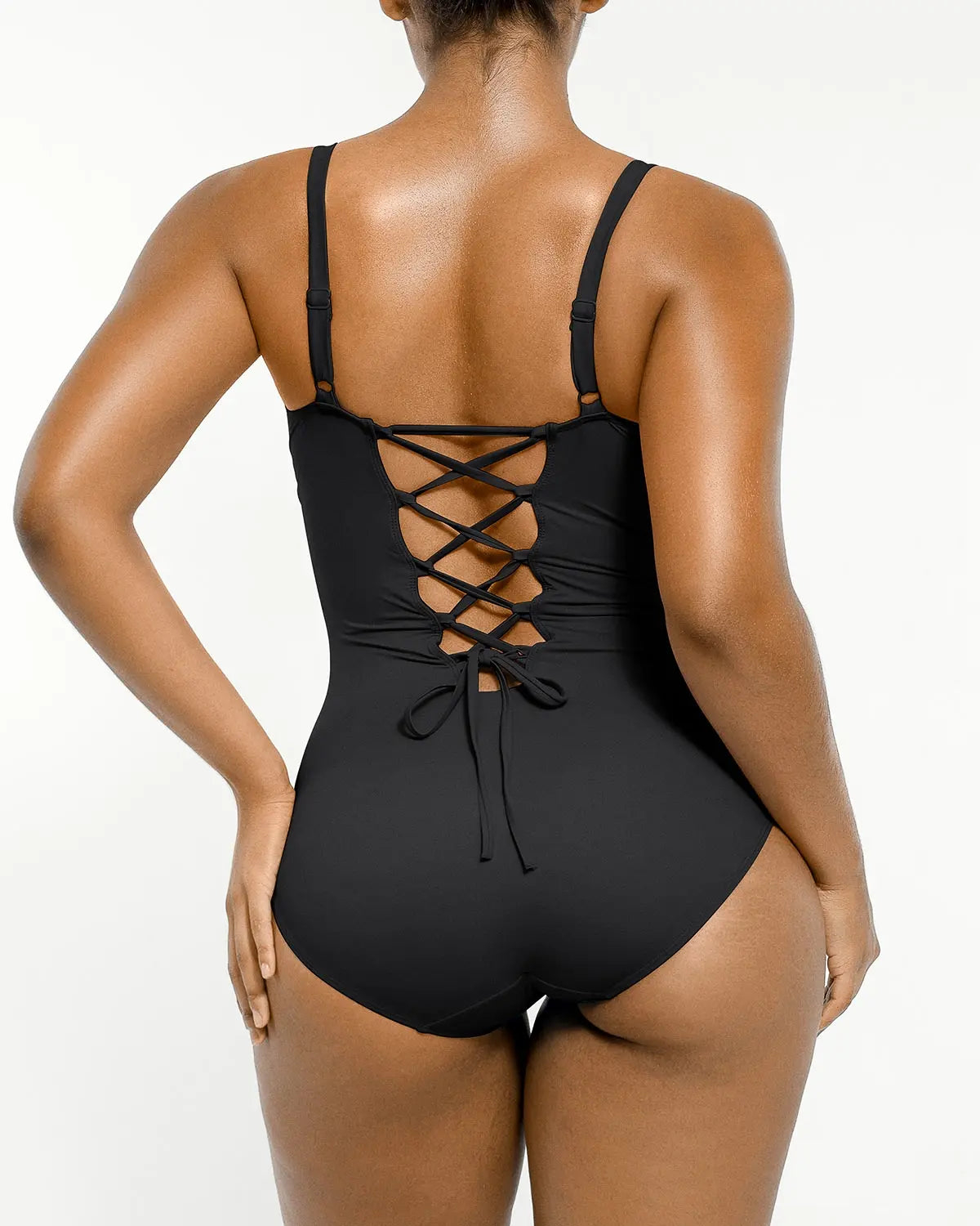 One-piece shaping swimsuit shown on model